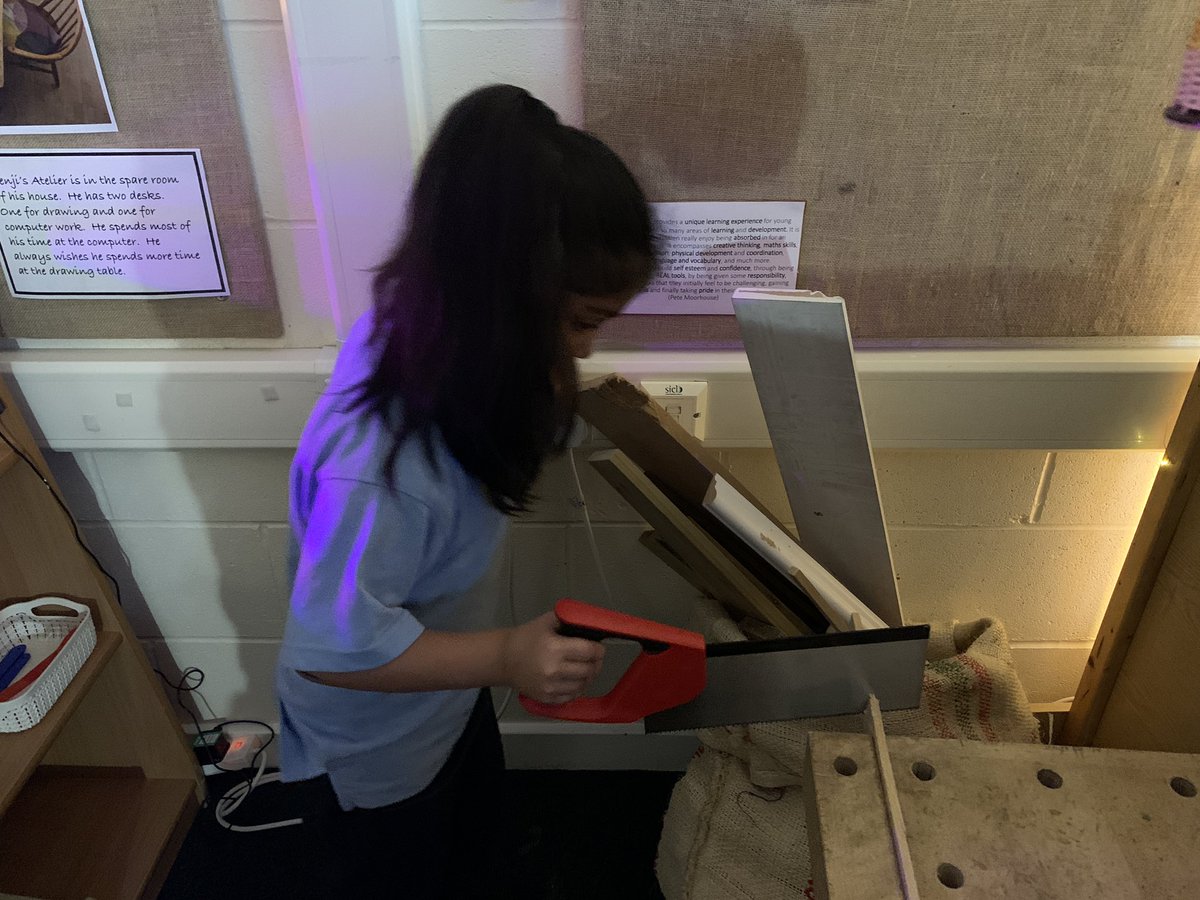 EYFSatStPhilips's tweet photo. A.  Adjusts the drill chuck to accept a larger drill bit having progressed through the sizes of the bits to make her hole bigger.  She cuts her next piece of wood using the tenon saw and then measures the length of her wood using a tape measure #Woodworking @STPHILIPSCE https://t.co/i1YXTxbRPb