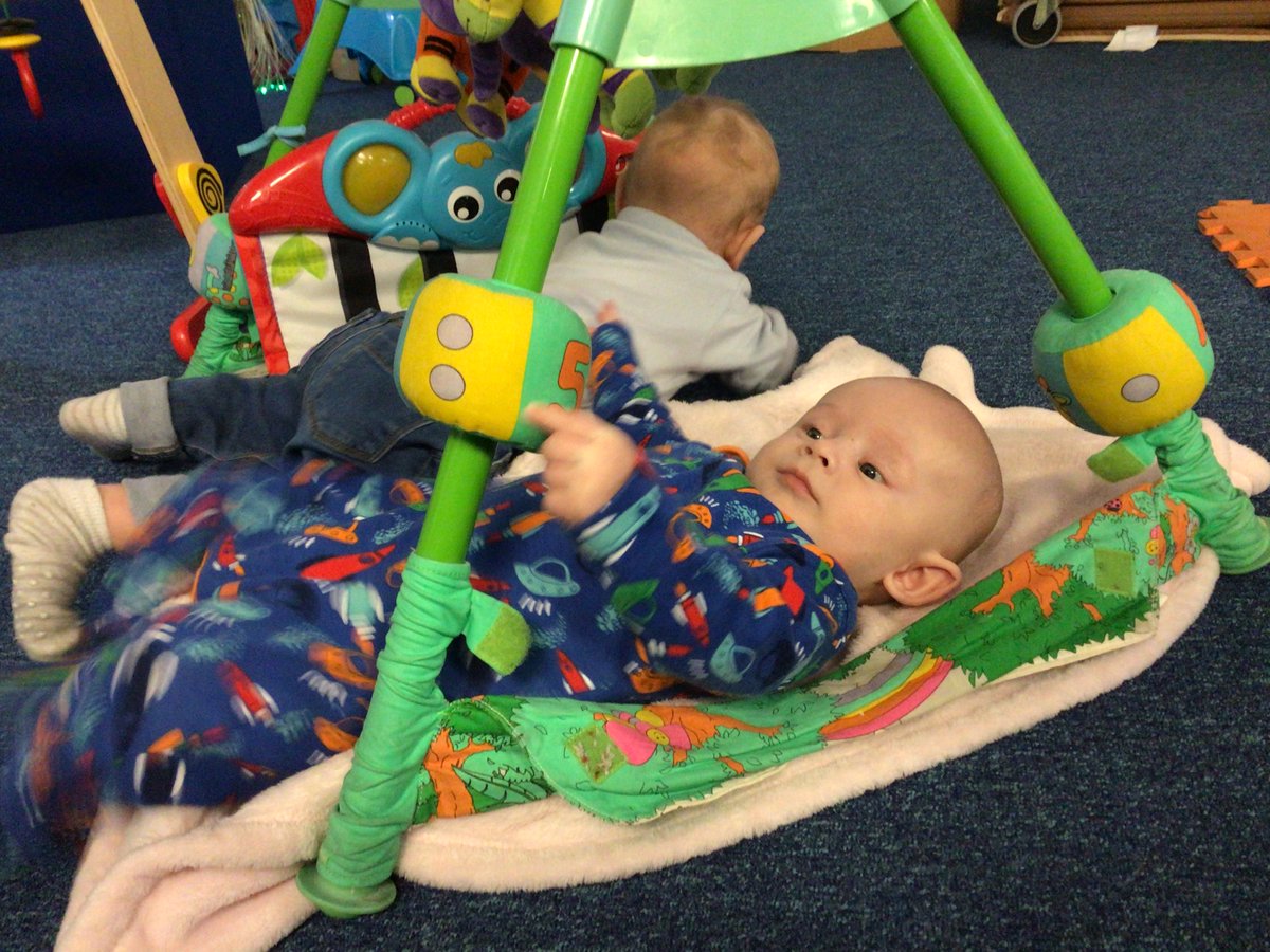 Nurseryboule's tweet photo. Kensley is starting to reach out and grab toys with palmer grasp, he’s happy being close to other children which is a good job because Harvey has invaded his space #reachoutandtouch #keepfriendsclose #spaceinvader https://t.co/x16kGXmbfH