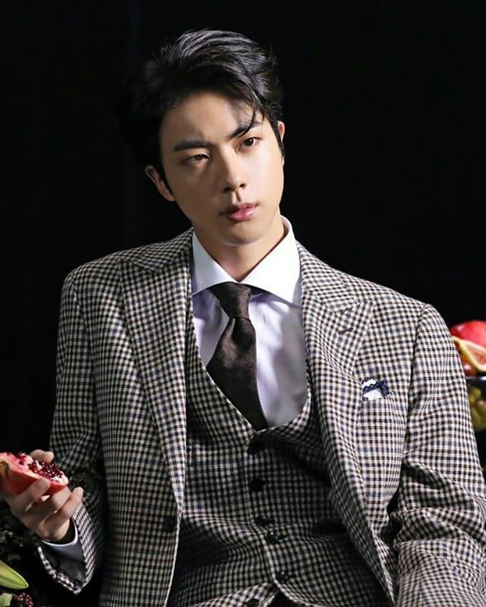 7/N Jin ( https://en.wikipedia.org/wiki/Kim_Seok-jin), known as “Worldwide Handsome” has the bravado and flair of Franklin. He is an adept dancer and a trained actor. His main contribution to the group besides his looks and acting chops is his vocal stability.