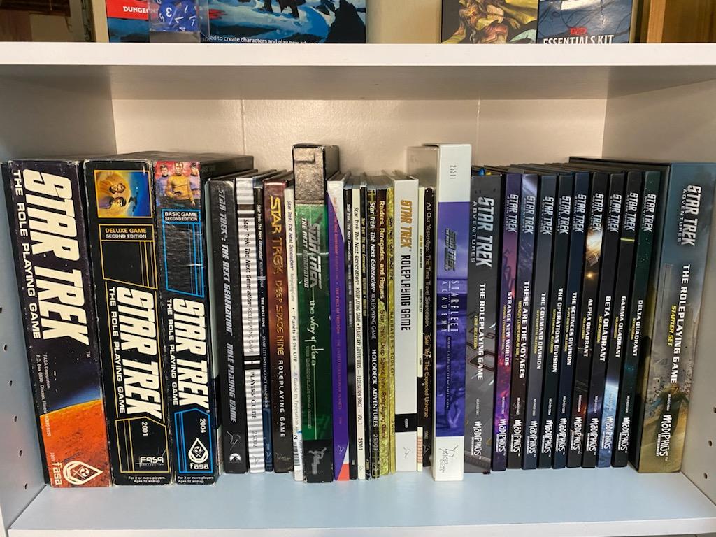 Yooooo it's #TrekRPGTuesday!! It's likely you've never heard of #TrekRPGTuesday, but I've decided it's a thing now. Here's my shelf of #StarTrek rpg materials. I've got stuff form FASA, Last Unicorn Games and <a href="/Modiphius/">Modiphius</a>. 

What was your first Star Trek #rpg?

#tabletop #ttrpg
