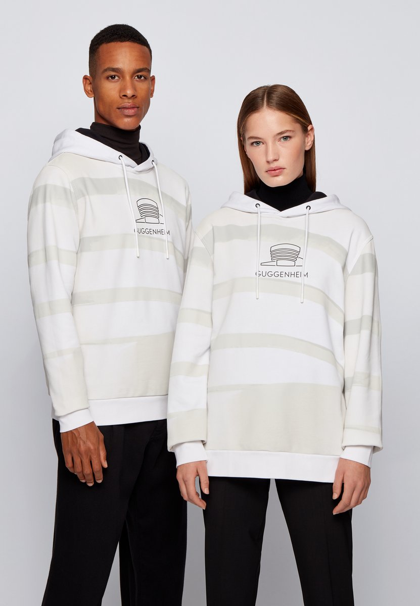 Guggenheim's tweet photo. To commemorate the #HugoBossPrize 2020, @HUGOBOSS created a limited-edition sweatshirt—the all-over photo print of our iconic Frank Lloyd Wright-designed building activates an Augmented Reality experience through an Instagram filter. Learn more: https://t.co/AzSsQe9ODs https://t.co/mNyv7kho9a