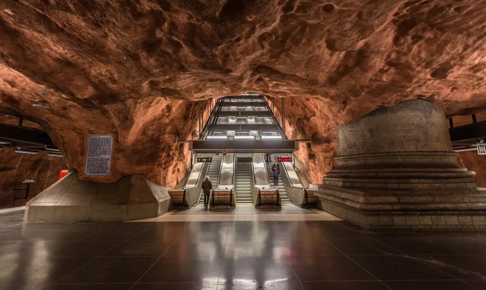ProctorSteph's tweet photo. #COMS324 our discussion about how the natural landscape is manipulated by humans made me think of the Stockholm metro--architects chose to leave the rock exposed as part of the design. Very futuristic to integrate nature into our built environment, rather than dominate&amp;destroy it https://t.co/CgVLo74sX0