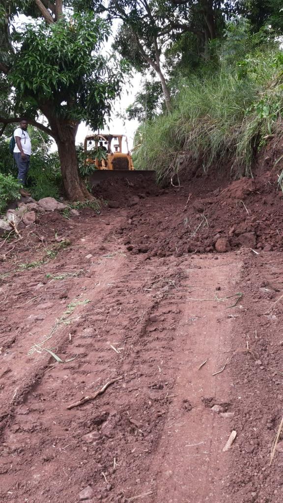 NWA_JA's tweet photo. Bull-dozer at work on the Savage Pen Road. We are working to convert this 1.6km long path into an appropriate road to accommodate vehicular traffic as an alternative to the Gordon Town Road, which is now closed at "Stand Up Hill". https://t.co/ZaDvYNlF3F