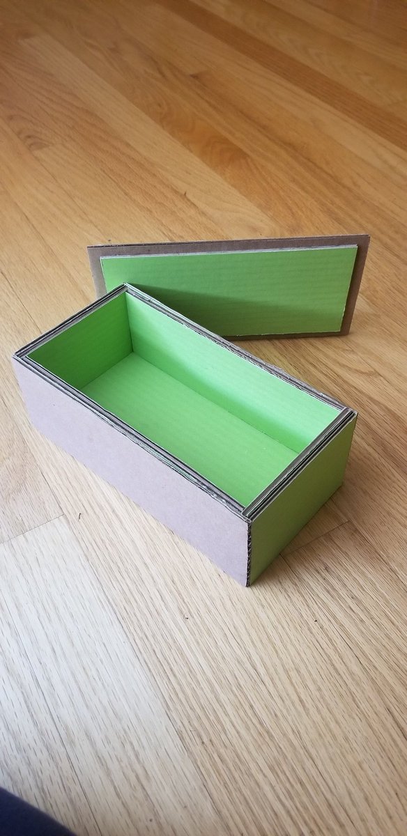 jwiese_CLS_Tech's tweet photo. What do the Woods I students do with no access to tools, machines or wood? They use all the same woodworking joinery, but they do it with cardboard. Behold the cardboard jewelry box! #CLSEngaged #cardboardwoodworking #remoteprojects https://t.co/u8eADASghI