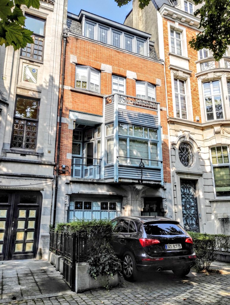 As Adrien is finishing the hobbit mansion in 1913, arch rivals Antoine Pompe and Fernand Bodson are inventing modernism opposite its driveway. Before the gauntlet can be picked up, war starts and they're all in exile, drinking at the Arts Club in Mayfair and designing the future.