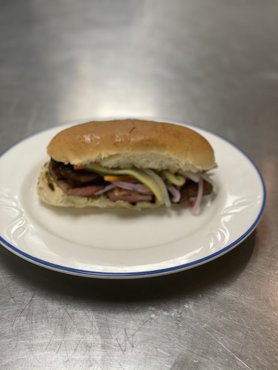 Made some sandwiches today, we got a pork banh mi with pickled carrots daikon and cucumber and red onion, then a chicken sandwich with slaw :)