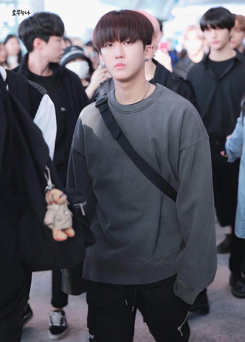 he looks serious but his sweater paws 