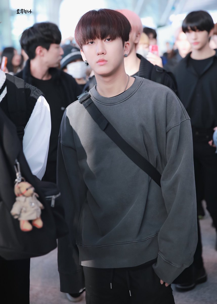 he looks serious but his sweater paws 