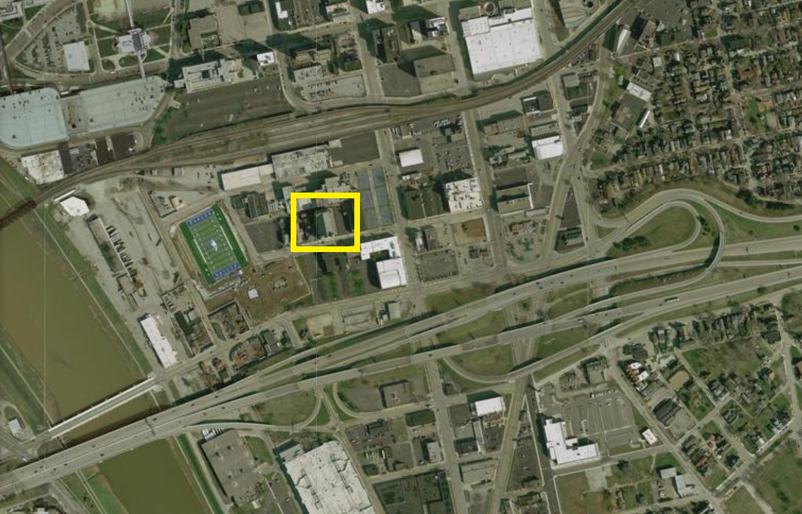 Emmanuel Catholic Church. You can see the destruction of the community to its south that was wrought by the creation of I-35. With the lower half of the community destroyed, the eventual move out of the upper half allowed for the land to be turned into a new Catholic school.