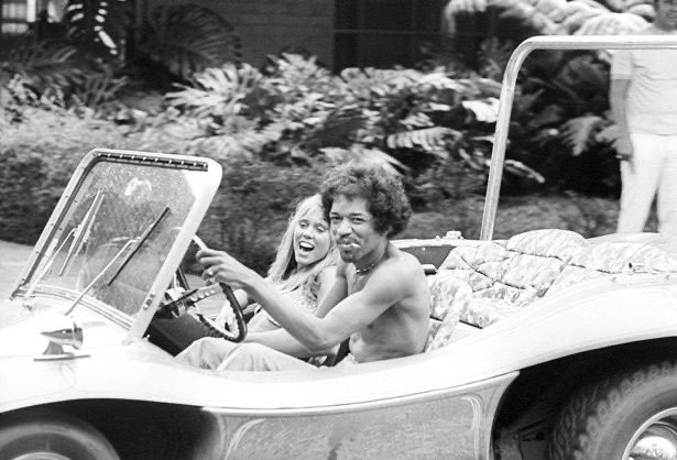 Super70sSports's tweet image. And now here’s Jimi Hendrix working on a lung dart and driving around a dune buggy.