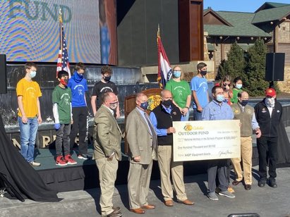 CoachMcDonald_'s tweet photo. Thank you Bass Pro for your generous donation to the National Archery in Schools Program! A shout out to Jarrett Archer, Jose Castillo, who participated in the celebration.  Great job Jose! @JarrettTrojans https://t.co/D5V5trU778