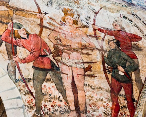 The closest analogy to the Greensted image is perhaps the remarkable late c15th wallpainting at Pickering, Yorks (although Pickering was HEAVILY touched up in the Victorian era)