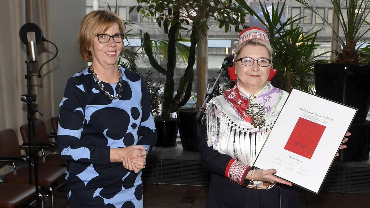 oikeusmin's tweet photo. Ellen Pautamo (Ergon Máreha Ánne Elle-Máret and Jonar Thomasson have been awarded the 2020 Nordic Sámi language prize Gollegiella. In the picture @EllenPautamo, Lecturer in the Sámi Language and Culture, and @anna_maja Henriksson, Minister of Justice. #gollegiella https://t.co/s9gHamU7EV