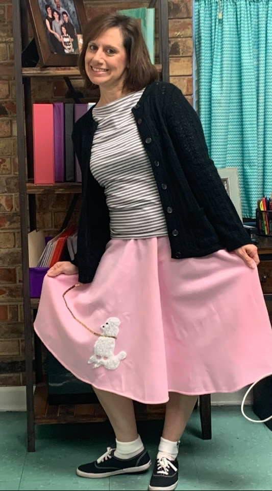 Misty_Richard's tweet photo. When it’s Ms. Dorsey’s birthday, you dress in your 50’s attire or you support her favorite team. Who dat! https://t.co/Msz7hMBDR4