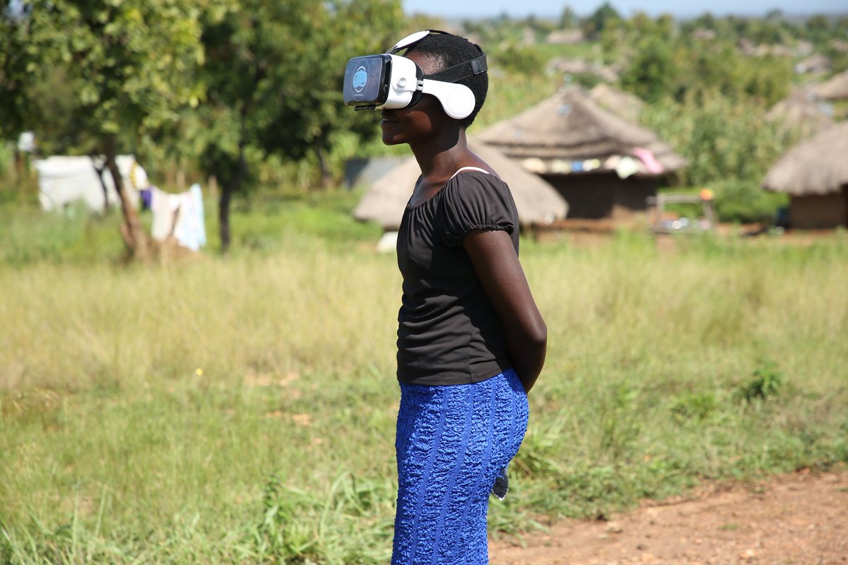 A #Refugee young woman having a thrilling #VirtualReality experience during our #VR4Peace event in Ofua 3, Ofua Zone - Rhino Camp.  #VR4Good #SeePeace  #VR4Women #VR4Community #goCDC