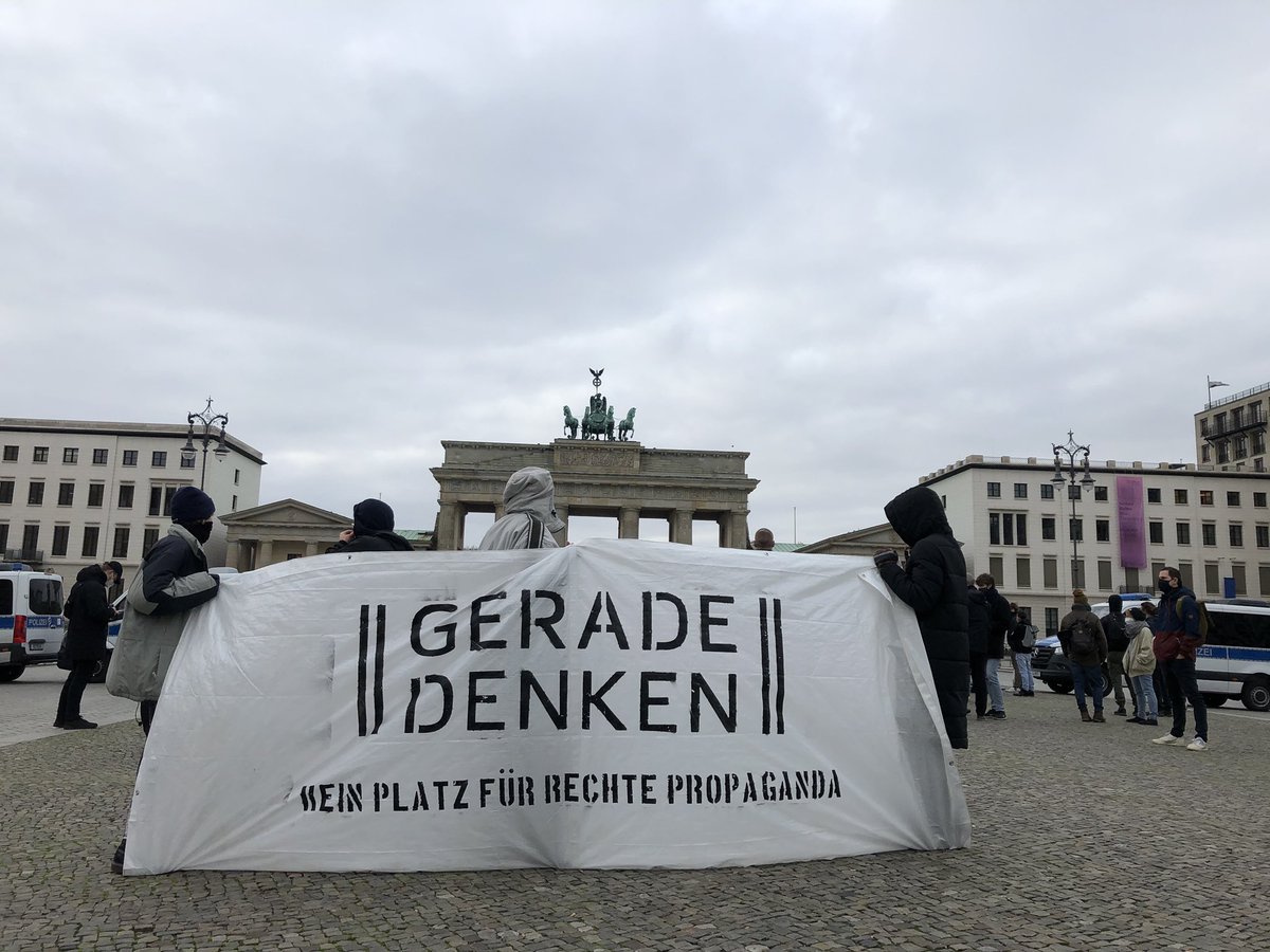 small antifascist counter-demo on the other side of brandenburger tor. about 50 people here. #b1811