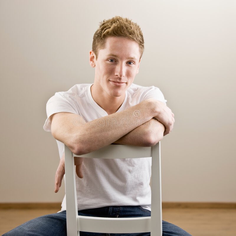 Is sitting on a chair like this still considered cool? 