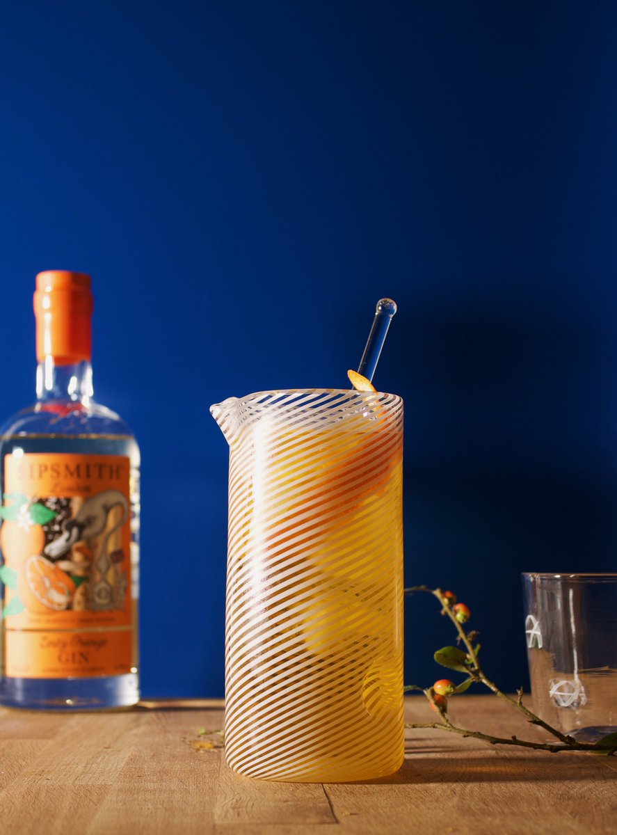 BenefieldGlass's tweet photo. Ever since we were commissioned to make bespoke Gin tumblers for @sipsmith I confess I’ve become a partial to an Orange Martini⁣
⁣
As luck would have it, our Filigrana  pouring cylinder is perfect for making mixed drinks. What’s yours? 
https://t.co/Fvzkck34bd  https://t.co/BwvyQTLz8I
