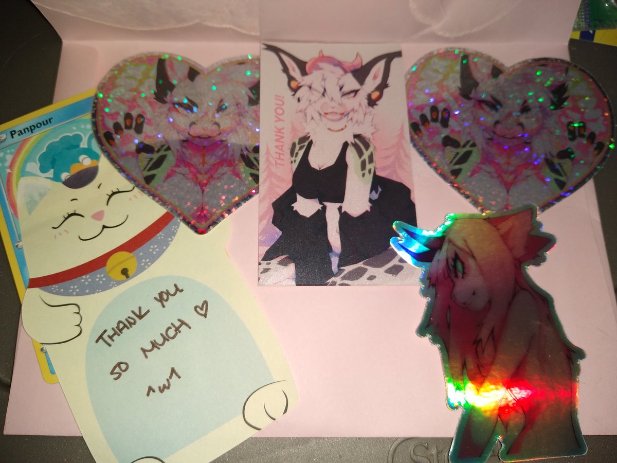 ToxicKhaos666's tweet photo. Stupid me forgot to post these. I got my order from @Iynxxe a lil bit ago and I'm in love 😍😍 So shiny!! The first is with the flash.

THANK YOU SO MUCH GHOST! 💙

#furryart #stickers #sparkles #giftorder #hellacute #soadoarable https://t.co/5vYGGTIubn