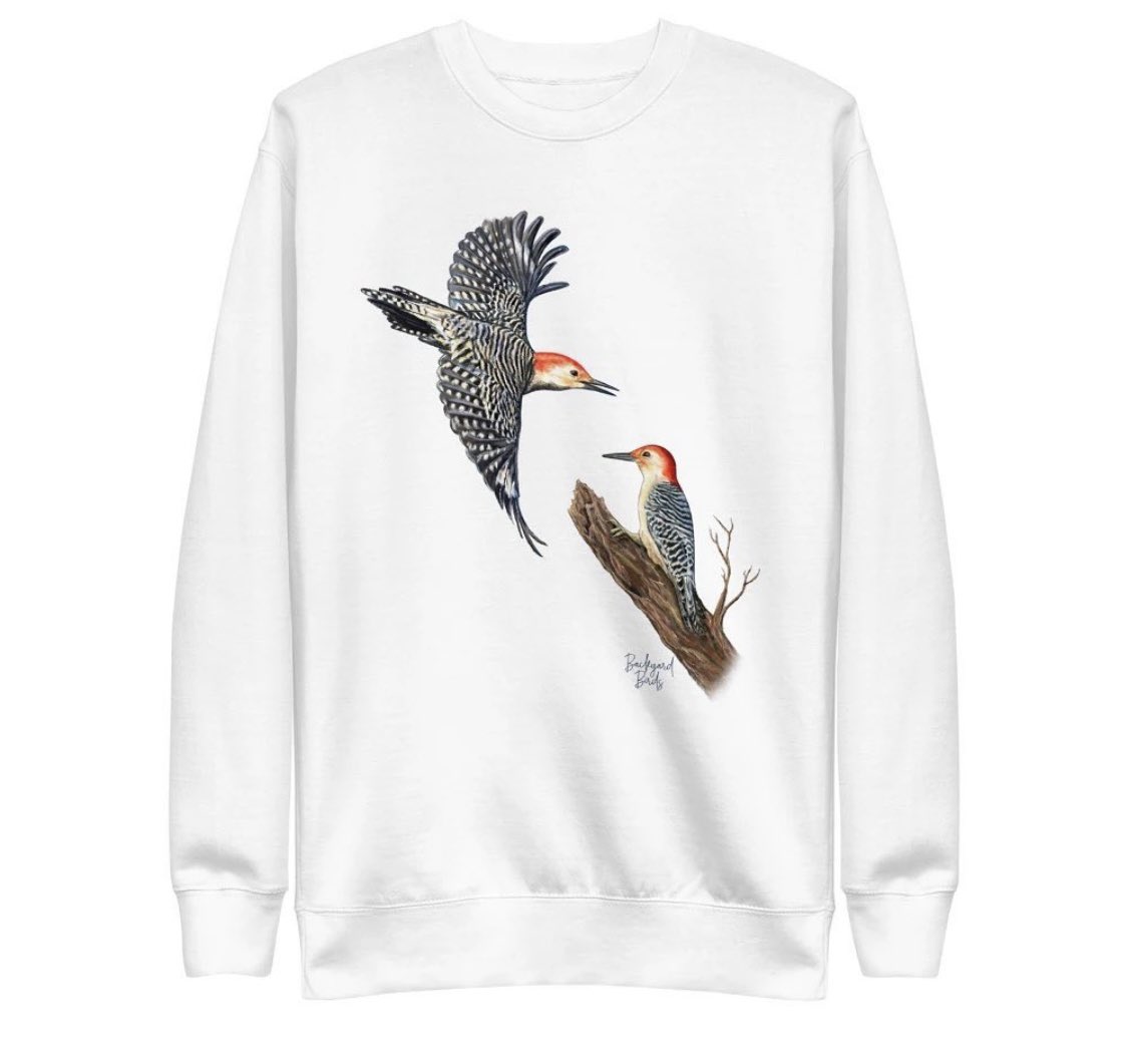 backyardbirdsco's tweet photo. Just a sneak peak of our new Red-bellied Woodpecker sweatshirt. Visit our store(link in bio) to see more.
 And if you want to attract them to your home, try a fruit and nut blend in a tube feeder.
#birds #backyardbirds #backyardbirders #woodpecker https://t.co/KSbgejn6XD