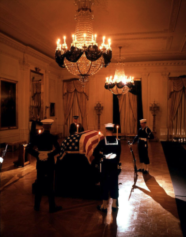 In this picture, servicemen stand guard around the casket of President John F. Kennedy in the East Room, with the chandeliers hanging overhead. (8/8)Image Credit: White House Historical Association