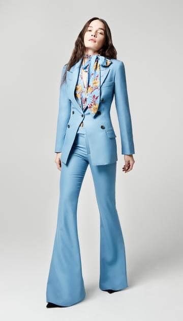 2. Wear with a blazer. For an official but causal look, the bootcut jeans is recommended but for full-on official, co-ordinate the fabric of the pants and blazer.