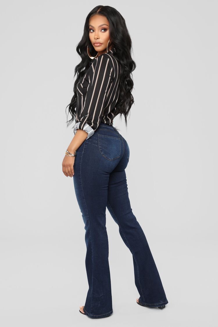 3. Wear with a pretty blouse, loose or not. Tuck it halfway in or totally. This can help balance your proportion and draw attention to your upper body if need be.