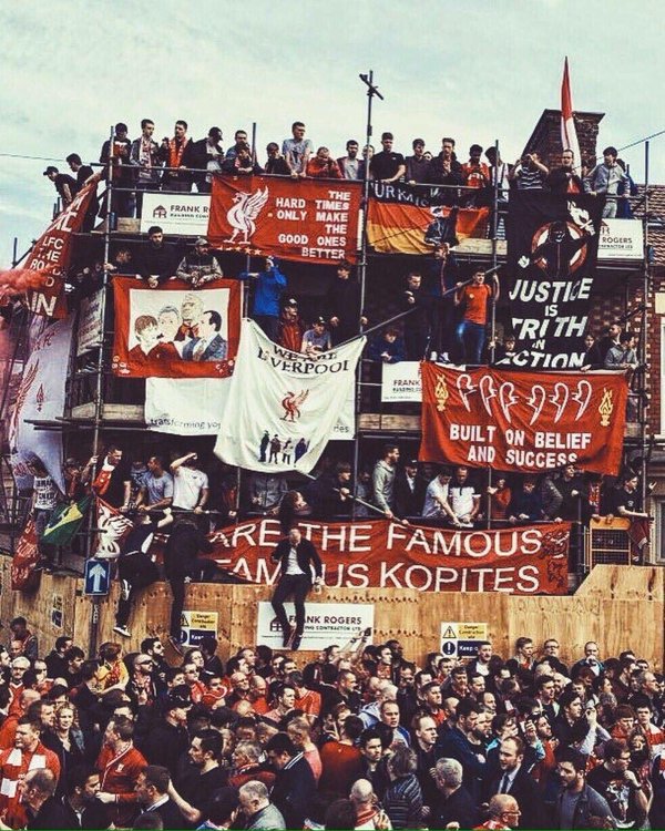 An iconic photo of the most famous supporters on the planet. #Kop #LiverpoolFC #scaffolding #LFC #supporters
