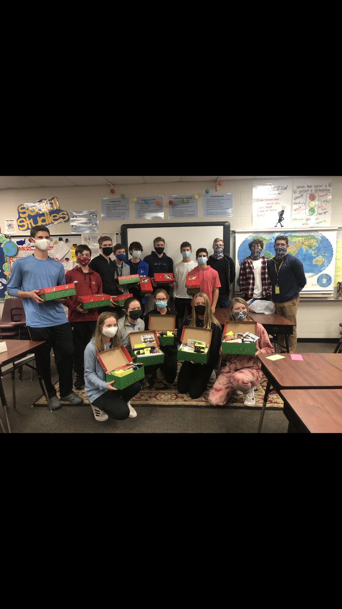 GolfBer's tweet photo. HarBer Golf Team packing Operation Christmas Child boxes. https://t.co/SGC6A6CBEl