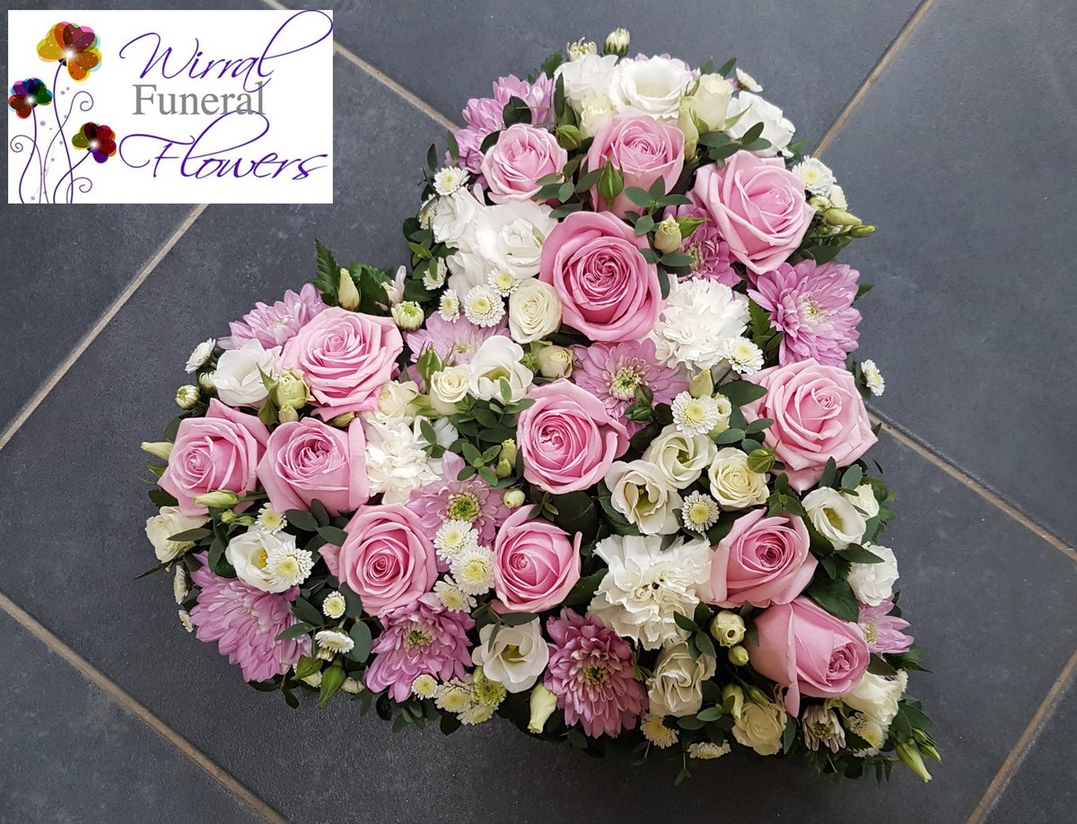 Heart in pink & white #wirralfuneralflowers #funeralheart #birkenheadflorist #Wirral #pinkrose #prettyfuneralflowers #funeraltribute