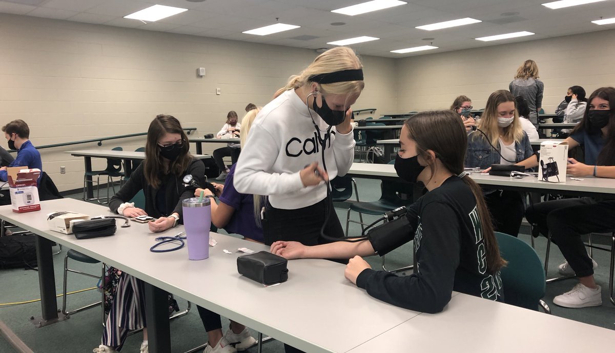 MWHOSA's tweet photo. Masked up, sanitized and continuing to learn! Millard West HOSA practicing blood pressure skills. #futurehealthprofessionals @jsutfin @getiemann @MWHSactivities @hosafhp https://t.co/6QGSTJFaqv