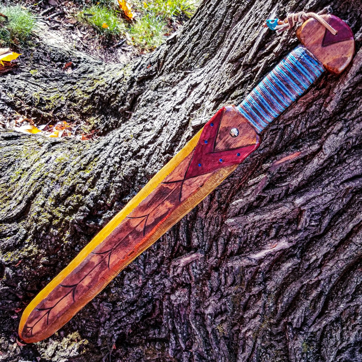 MangoWolfWorks's tweet photo. Made this "amber" sword a while back and it's been a pretty consistent part of my costume loadout ever since.
It's made from wood with a clear resin blade and a yarn wrapped grip.
#woodensword #resinart #woodwork #fantasyprop https://t.co/Du8oGzlJQ5