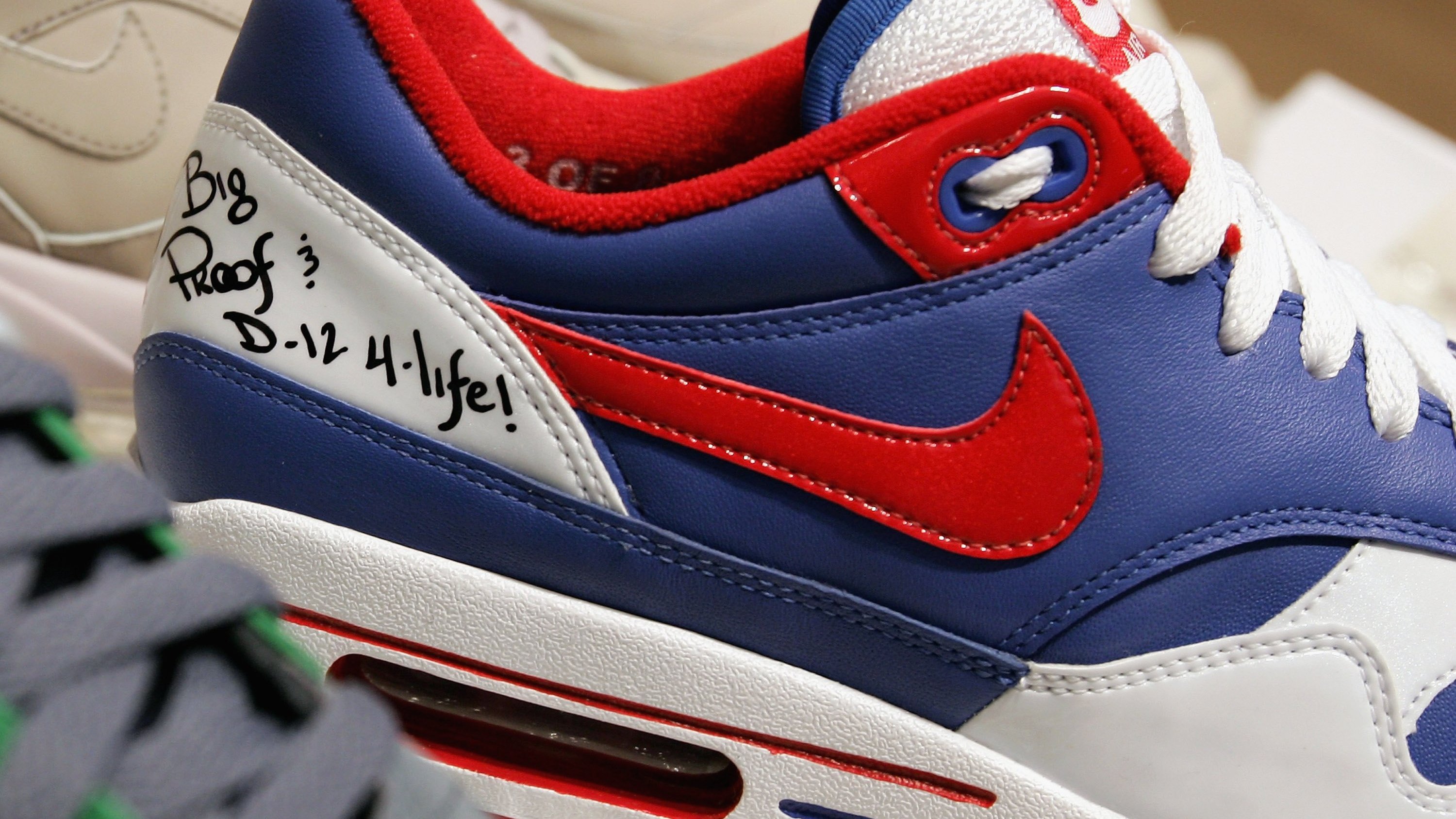 Sneaker Salaries on Twitter: "Limited edition Air Max series trainers designed and signed by rapper Eminem on display at NikeTown London's Festival of Air at Nike Town on 31, 06' in