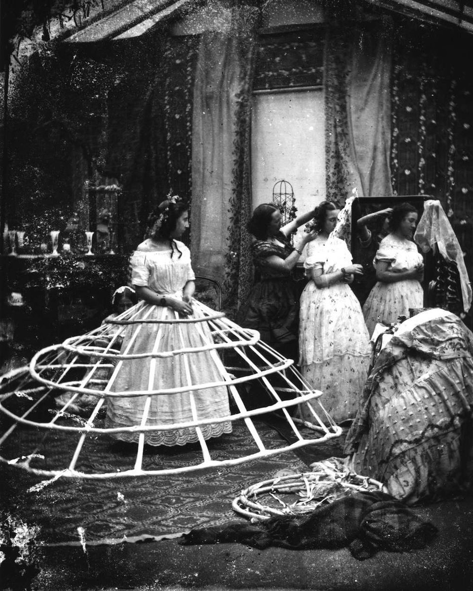 Staged photographs showing women wearing exaggeratedly large crinolines were quite popular, such as a widely published sequence of five stereoscope views showing a woman