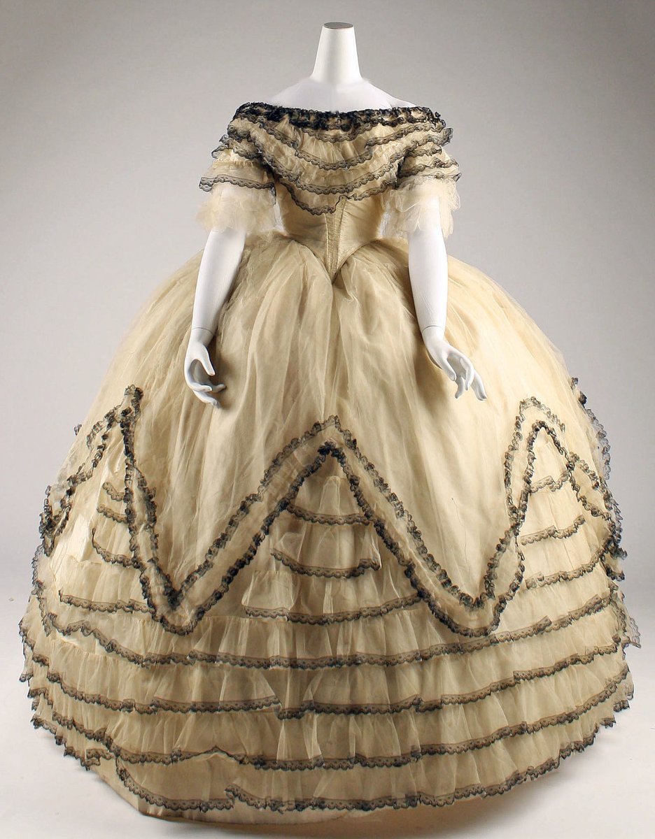 The crinoline needed to be rigid enough to support the skirts in their accustomed shape, but also flexible enough to be temporarily pressed out of shape and spring back afterwards.