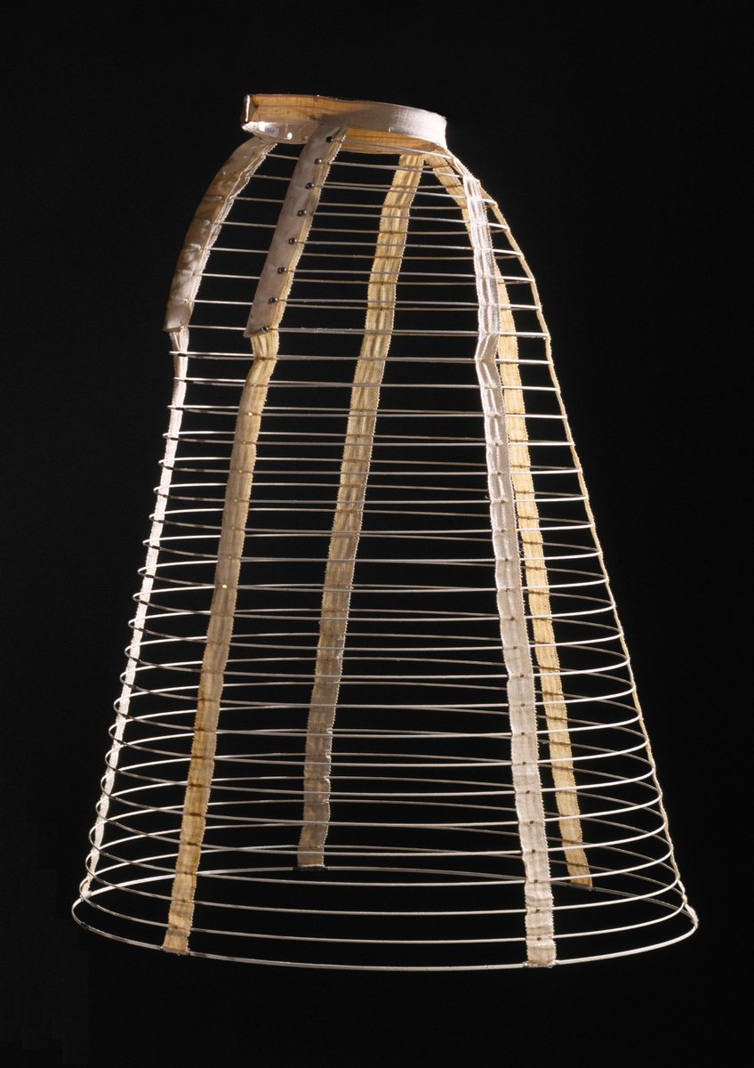 As the fashion for crinolines wore on, their shape changed. Instead of the large bell-like silhouette previously in vogue, they began to flatten out at the front and sides, creating more fullness at the back of the skirts (sometimes called eliptical crinolines).