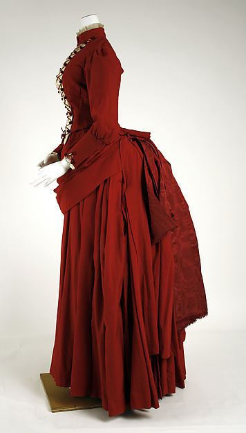 By the 1880s, the soft curve bustle dresses of the early 1870s were replaced with a new distinct silhouette featuring a severely tailored figure from the front and added draperies to the back.
