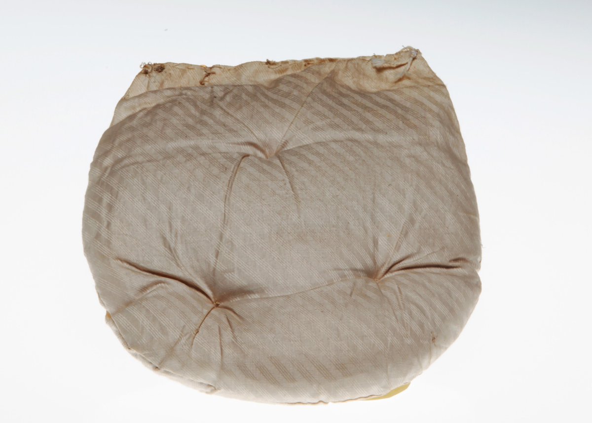 While not as extreme as examples from the mid-1880s, the woven wire or quilted hip pads worn beyond the turn of century show the tenacity of the full-hipped female ideal.