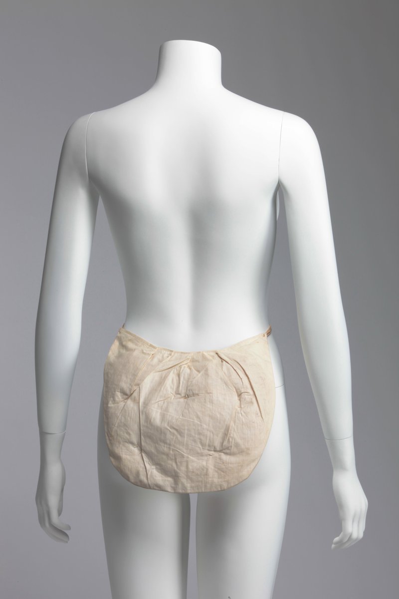 While not as extreme as examples from the mid-1880s, the woven wire or quilted hip pads worn beyond the turn of century show the tenacity of the full-hipped female ideal.