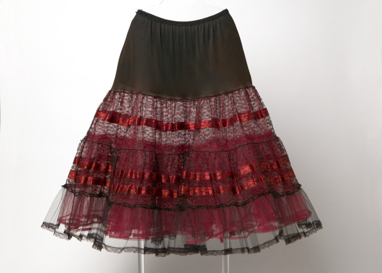 In the 1950s, post-war prosperity and wealth led, in part, to the re-emergence of the crinoline and its voluminous skirts.