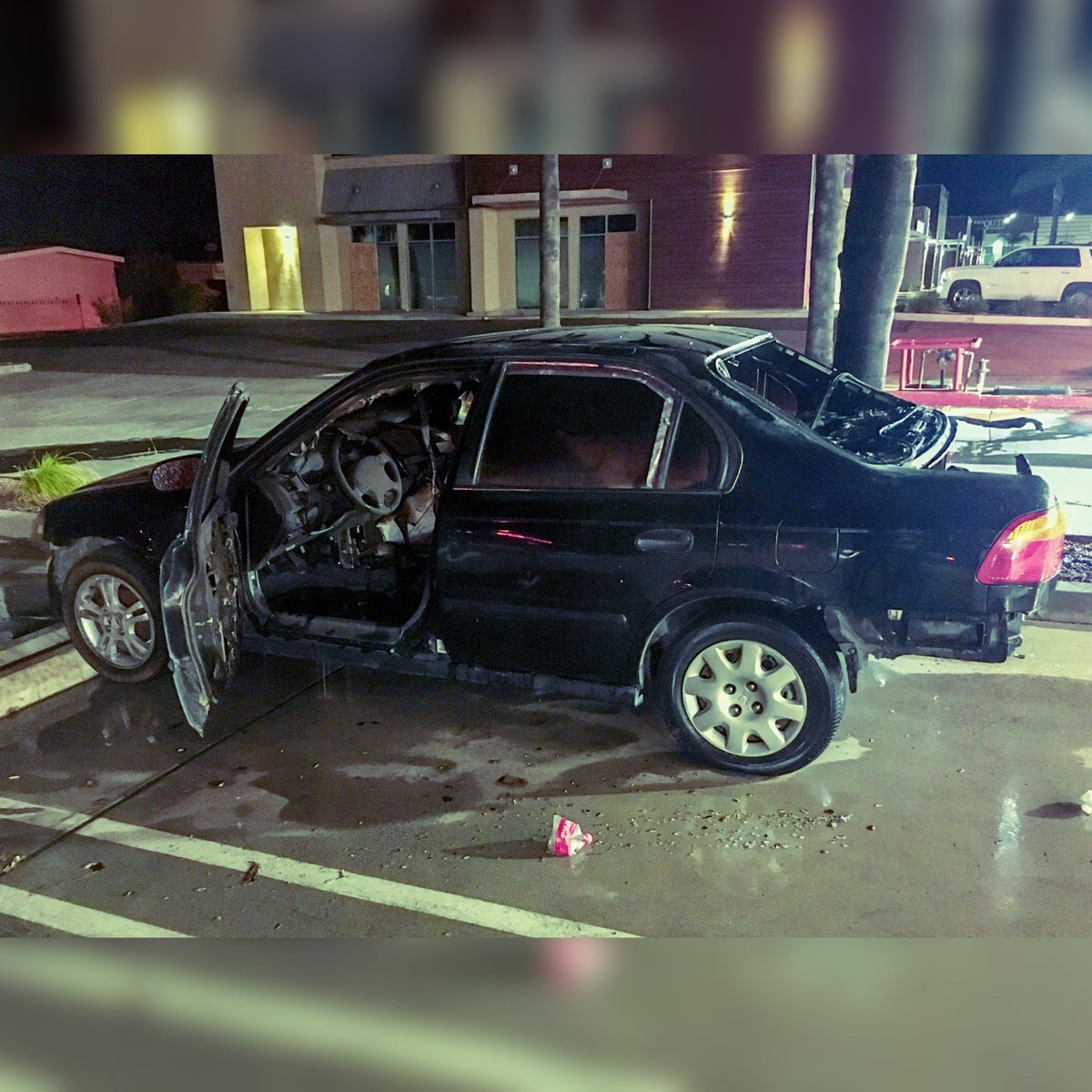 Photo of a burned car in an arson case in Vista.
