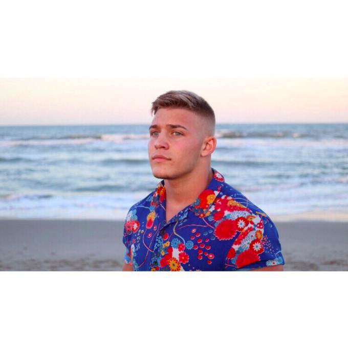 Does anyone know who the photographer for this picture of Brad Jaxon was? It's literally PERFECT for