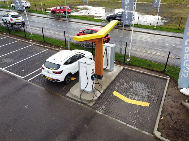 electricfelix's tweet photo. A bit surprised by the newest @Fastned station in the UK! #MarkWard just shared the photo over on LinkedIn. This is Fastned Dundee just off the A90 and I heard there's decent coffee around. It better be true with those 50kW chargers! Is there hope for HPC expansion in the future? https://t.co/6NFsg9r6qK