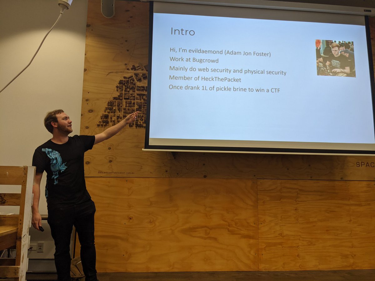 drunkrhin0's tweet photo. @evildaemond talking about things and stuff at @sectalks
#HeckThePacket https://t.co/JNHM5aks1I