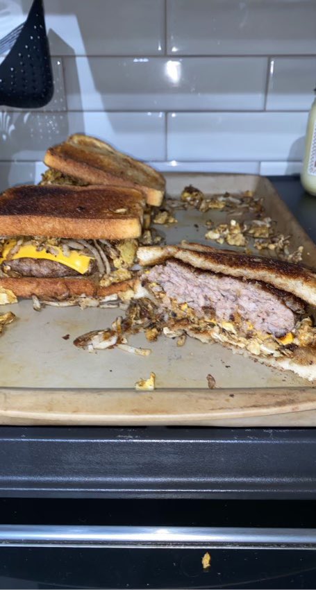 🍔🍔 BREAKFAST BURGER 🍔 🍔 
This is a sausage patty with cheese on a bed of eggs and hash browns between toast!!