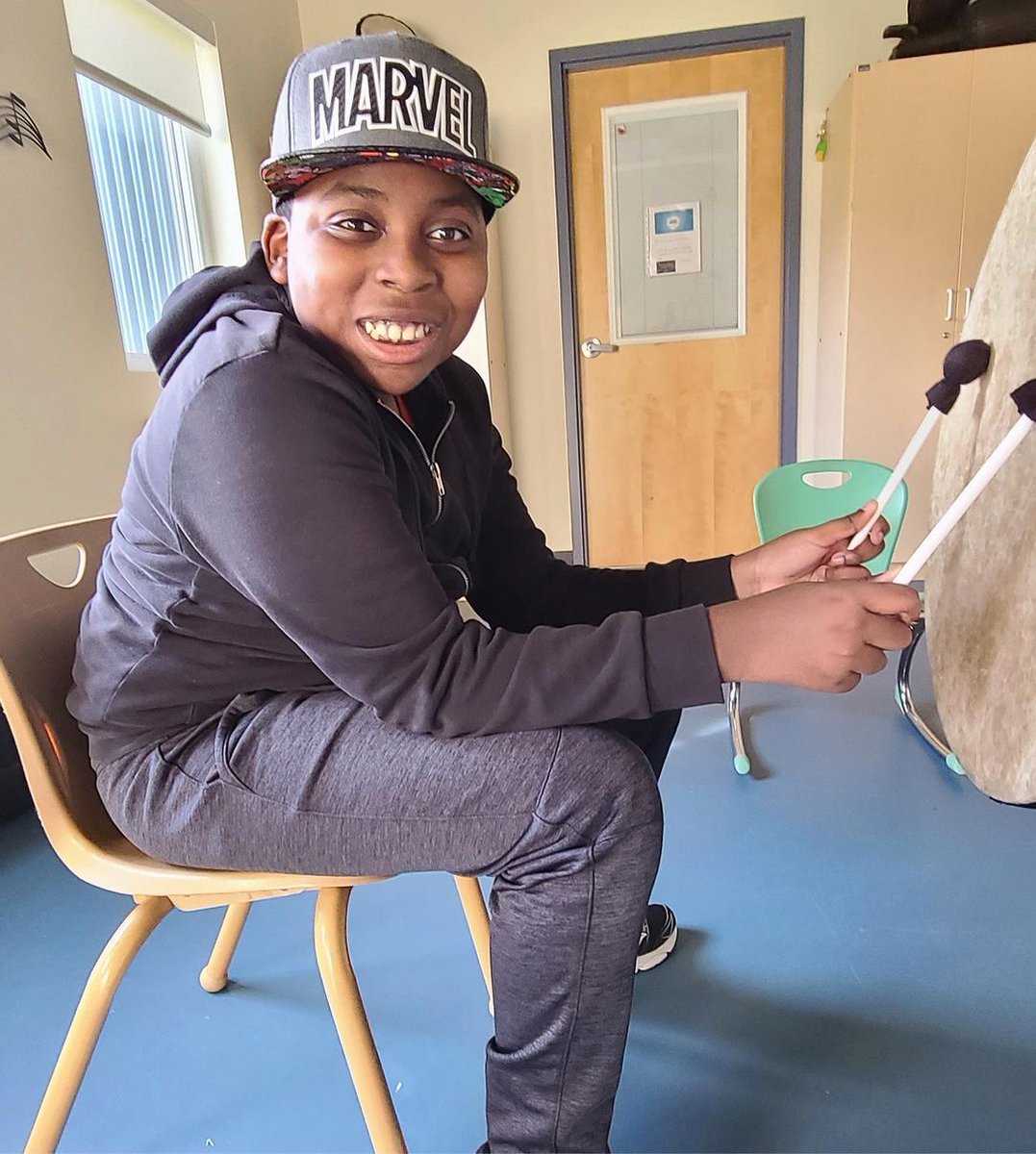 RESCalgary's tweet image. One of our elementary students loves playing the drums, because “The drum beat makes me feel happy”! Accredited Music Therapists use elements of music including rhythm, pitch or dynamics within drumming sessions to meet a therapeutic goal or objective.  #drumming #musictherapy