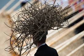 The next scene shifted to pagan druid ceremony, with the actors now draped in black subdued clothing and adorning nests, plants and trees on their heads.