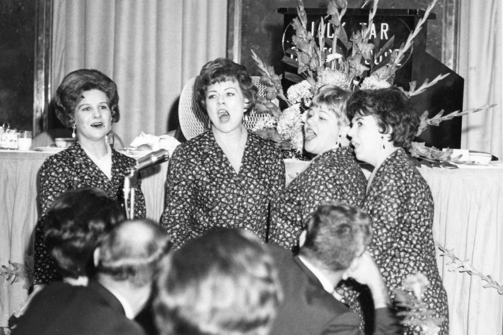 ebrpl's tweet photo. #TBT This is a photo of the Sweet Adelines performing at the Fire Prevention Week Banquet in 1967. You can find this photo and more in the Baton Rouge Room's digital archive on our website. #ebrpl #BRHistory #BatonRouge #BRFD https://t.co/IUGQQX44Dc