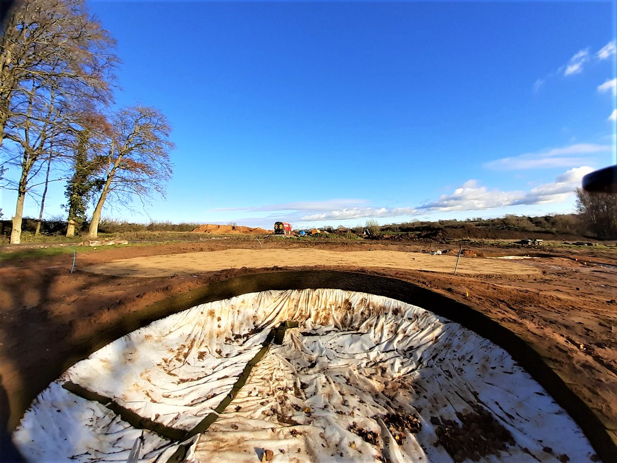GreenTygerD's tweet photo. Ecobunker construction update and nice to see a little sunshine for once. The bunker base has a temporary cover sheet which will be removed when it is ready for sand. #greentygerdesign #bunkerdesign #ecobunker #golfcoursedesign https://t.co/sYjnyuywLK