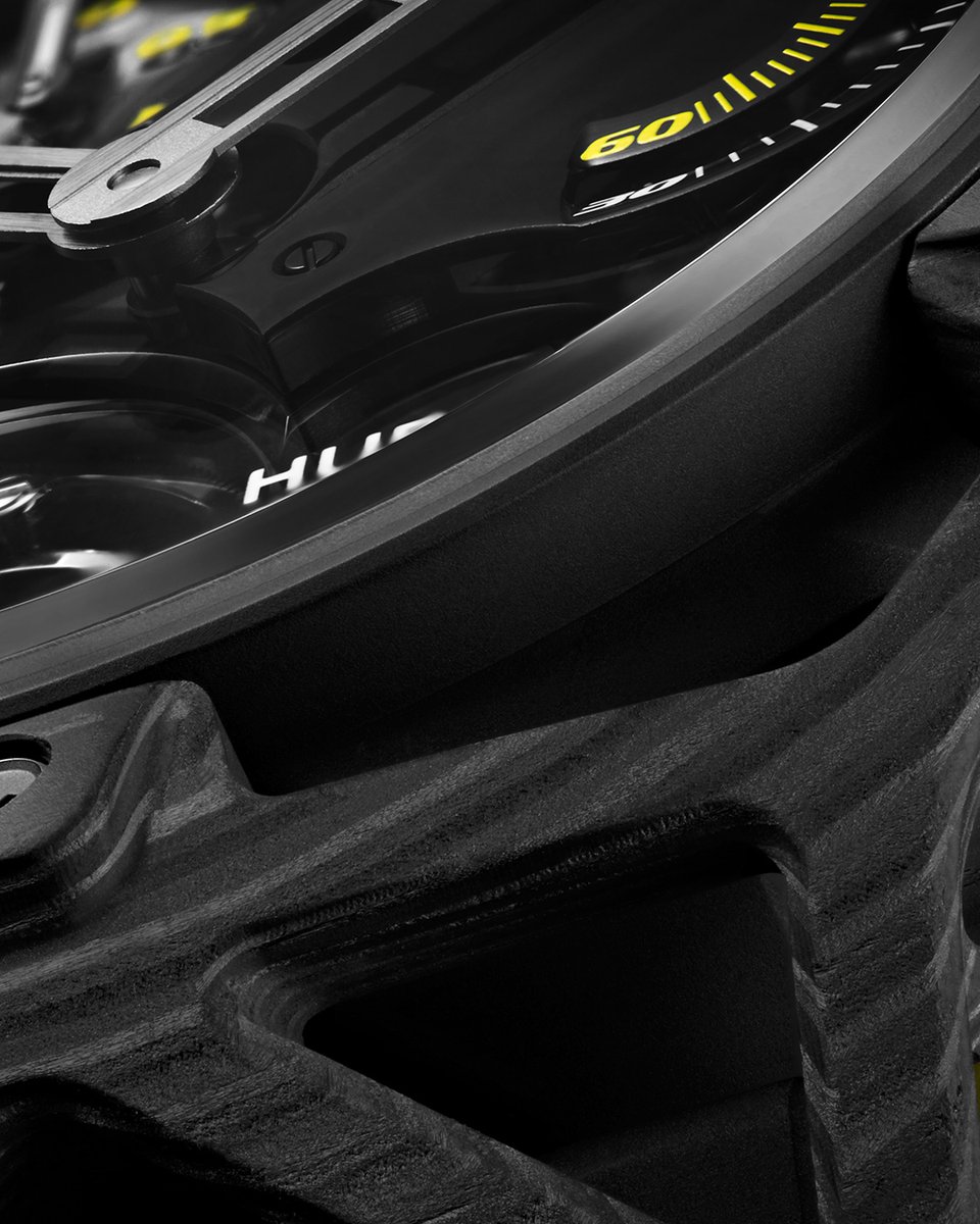Hublot's tweet photo. Take a closer look at our #Techframe Ferrari Tourbillon Chronograph Carbon yellow. The best of both worlds in a most unexpected execution! #HublotFerrari https://t.co/AoOfGgMdoh